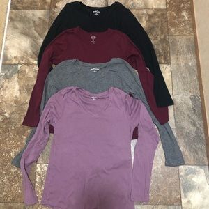 Ladies size medium long sleeve shirts.